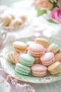 Pastel macarons on a vintage plate, sweet elegance. AI Generated