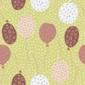 Pastel maroon and beige balloons with circles and dots print seamless pattern. Dotted pale yellow background