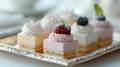 Pastel mini desserts showcase precision and creativity, inviting mindful enjoyment and portion control Royalty Free Stock Photo