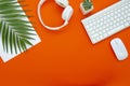 Pastel office desk table with a laptop and headphone. Top view with copy space. Flat Lay. Royalty Free Stock Photo