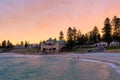 Pastel oinkand orange pastel sunrise skies over Cottesloe Beach Perth Western Australia Royalty Free Stock Photo