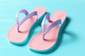 Pastel paradise flip flops in soft colors arranged with copy space