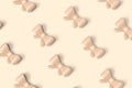 Pastel pattern background with cartoon bows.