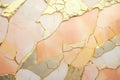 Pastel peach and gold abstract kintsugi background. Stone textured modern backdrop