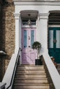 Pastel pink door on an English house in London, UK Royalty Free Stock Photo