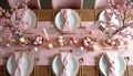 Pastel pink Easter table setting with decorative eggs and spring blossoms. Candles, plates, and cutlery arranged for a festive Royalty Free Stock Photo