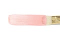 Pastel pink painted stripe with brush.