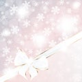 Pastel sparkly holiday background with an elegant bow