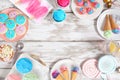 Pastel summer sweets frame over a rustic white wood background Royalty Free Stock Photo