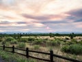 Pastel Sunset Landscape with Rocky Mountains in the Distance Royalty Free Stock Photo