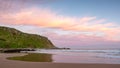 A pastel sunset with water reflections on the beach at Petrel Cove located on the Fleurieu Peninsula Victor Harbor South Australia