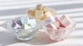 Pastel sweets in small bowls are perfect for enjoying tiny desserts and portion control Royalty Free Stock Photo