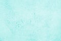 Pastel teal color textured surface background. Light cyan rough texture. Pale turquoise wallpaper