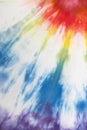 Pastel tie dye, a handmade pattern on a cotton t-shirt. Close-up, top view. DIY concept, handicrafts, original everyday clothes,