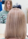 Pastel toning of long hair. Long blonde dyed hair.