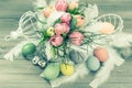 Pastel tulip flowers and easter eggs. retro style