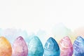 Pastel Watercolor Easter Eggs on White Background. Watercolor painted Easter eggs in soft pastel colors arranged in a