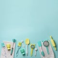 Pastel yellow, blue cooking utensils on turquoise background. Food ingredients. Cooking cakes and baking bread concept Royalty Free Stock Photo