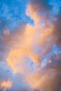 Pastel yellow, orange, pink, lilac, purple colorful clouds during sunrise twilight for background. Royalty Free Stock Photo