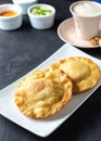 Pastelito traditional venezuelan food with coffee and sauce Royalty Free Stock Photo