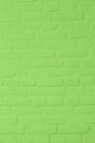 Pastell bright green colored brickstone wall