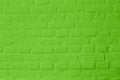 Pastell bright green colored brickstone wall