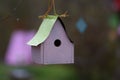 `The Pastels` pink and mint green bird house with pastel bokeh