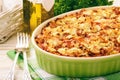 Pastitsio -greek casserole with pasta, meat, tomatoes and feta cheese.