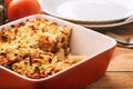 Pastitsio -greek casserole with pasta, meat, tomatoes and feta cheese.