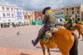 PASTO, COLOMBIA - JULY 3, 2016: police officers riding horses on the central square of the city