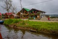 PASTO, COLOMBIA - JULY 3, 2016: some houses located next to the shore in la cocha lake close to the city of pasto