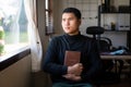 Pastor holding bible ready for church sermon. Christian preacher and Sunday worship concept. Royalty Free Stock Photo