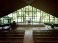 Pastor in its church looking outside the window