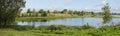 Pastoral village landscape on the lake in Belarus Royalty Free Stock Photo