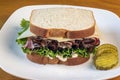 pastrami sandwich top with swiiss cheese on white bread Royalty Free Stock Photo