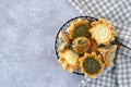 Pastries, fatayer or samosa, manaqeesh with zaatar and white cheese in metal basket