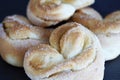 Pastries made from yeast dough with sugar sprinkles. Royalty Free Stock Photo