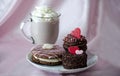 pastries and mug of chocolate mocha frappuccino with whipped cream