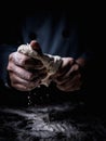 Pastry chef hand kneading Raw Dough with sprinkling white flour Royalty Free Stock Photo