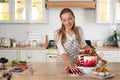 Pastry chef in the kitchen makes desserts, cakes and muffins. Cooking at home Royalty Free Stock Photo