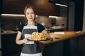 pastry chef in the kitchen makes desserts, cakes and muffins. Cooking at home. Delicious and beautiful homemade cakes Royalty Free Stock Photo