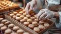 A pastry chef is making macarons in a bakery Royalty Free Stock Photo