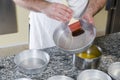 Pastry chef prepares hazelnut cake