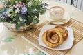 Pastry with coffee in Typical parisian cafe Royalty Free Stock Photo