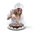 Pastry cook prepares a cake Royalty Free Stock Photo