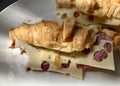 pastry, croissant with hard cheese with holes, prepared for tea