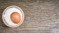 Pastry flour on bowl and rustic wooden background / homemade flour egg cooking ingredients on table Royalty Free Stock Photo