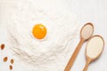 Pastry ingredients. Egg, flour and yeast on white