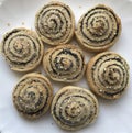 Pastry with poppy seeds on a plate. Confectionery. Cooking, baking, sweet, calories, diet, breakfast.