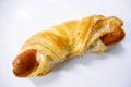 Pastry sausage puff on white